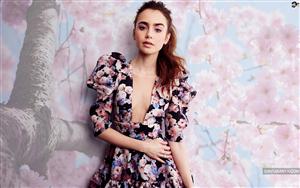 Lily Collins looks pretty in floral puff sleeves dress